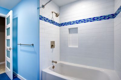 Small Shower with Tiled Accent Wall